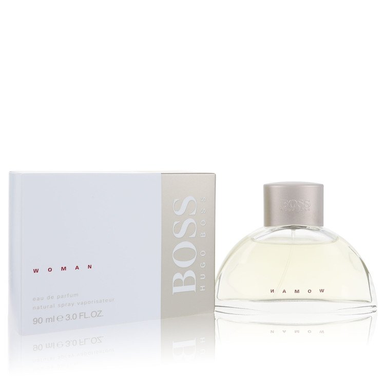 BOSS Woman Eau de Parfum 90ml bottle with its white and silver packaging box, displayed on a reflective white surface.