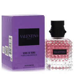 Valentino Donna Born in Roma Purple Melancholia Eau de Parfum bottle with a textured pink liquid and black cap, shown next to its purple and black packaging box.
