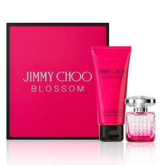 Jimmy Choo Blossom perfume set with pink packaging on a white background